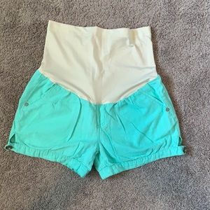 Woman’s maternity sea-foam green linen shorts.